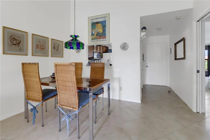 Dining room featuring light tile patterned floors