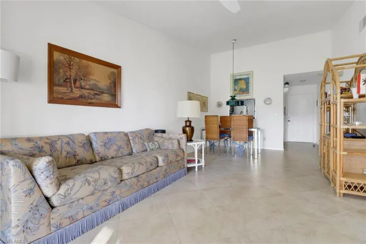 Living room with light tile patterned floors