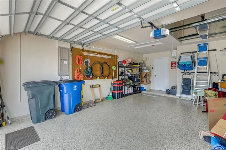 Two-Car Garage with Epoxy Flooring and Tankless Water Heater.