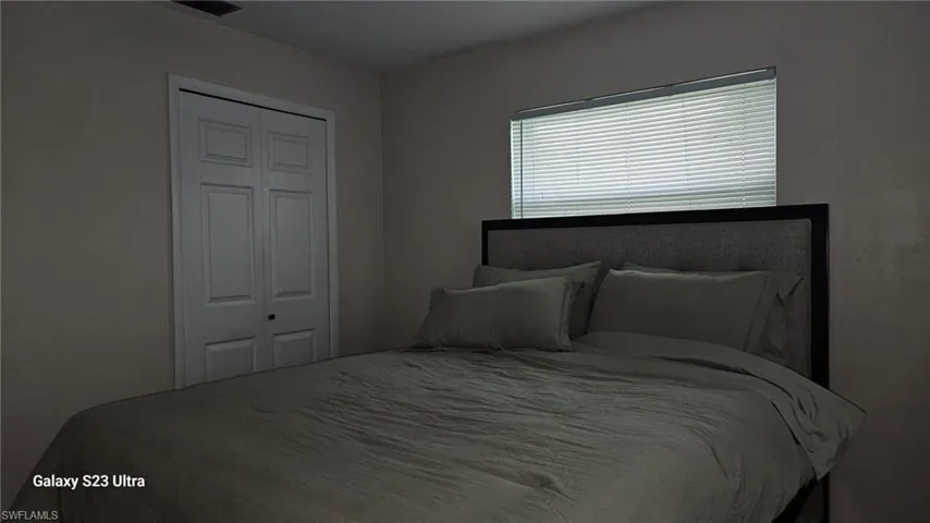 Bedroom featuring a closet