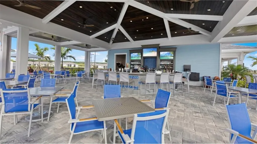 View of patio / terrace with outdoor dining area and ceiling fan