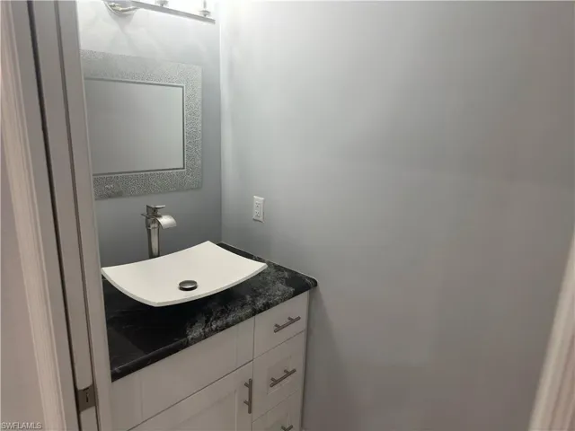 Half Bathroom featuring vanity