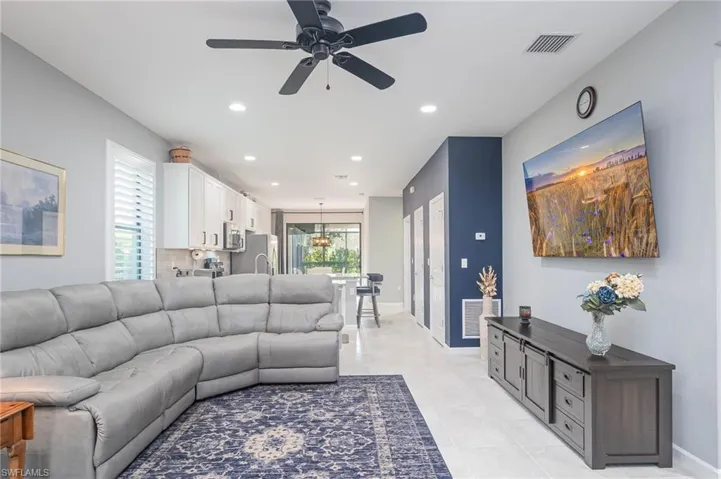 Living area with kitchen in the background