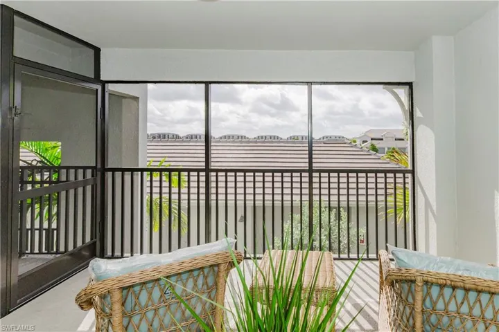 Sunroom featuring plenty of natural light