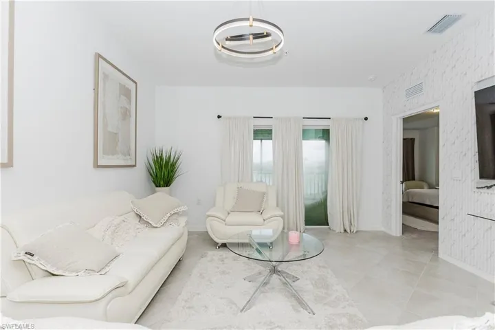 Living area featuring baseboards