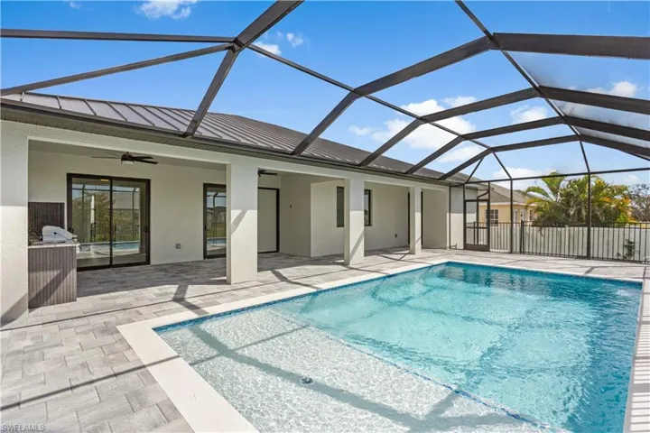 PAVER FLOORING & CEILING FAN create COMFORTABLE SPACE for YEAR-ROUND ENJOYMENT.