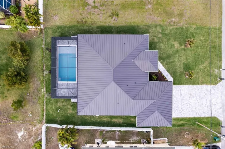 SCREENED LANAI provides PERFECT SETTING TO SWIM in SALTWATER POOL, or HOST UNFORGETTABLE BBQs while enjoying THE BEST OF SWFL LIVING!