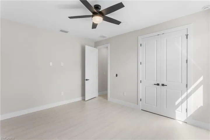 SPLIT LAYOUT offers SECOND PRIMARY SUITE w/ POOL BATHROOM & TWO GUEST BEDROOMS w/ HALL BATHROOM for added privacy.