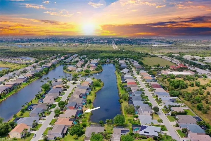 Aerial view with a residential view and a water view