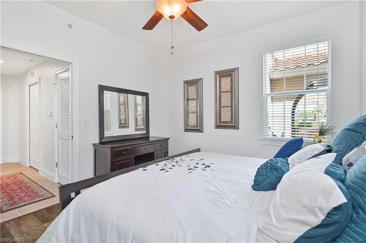 Bedroom featuring ceiling fan and light wood finished floors