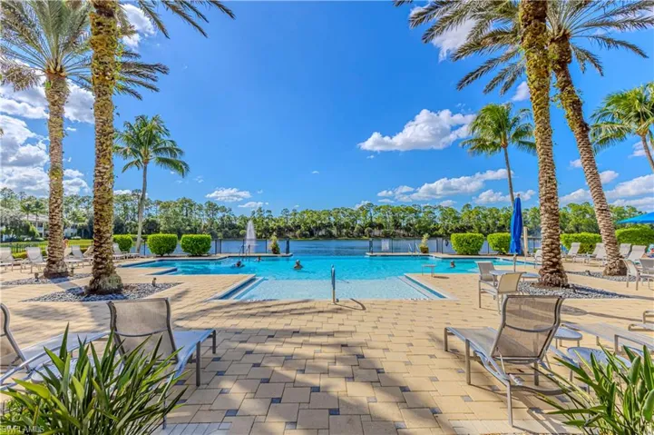 Community pool featuring a patio