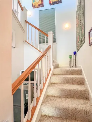 Stairs featuring baseboards