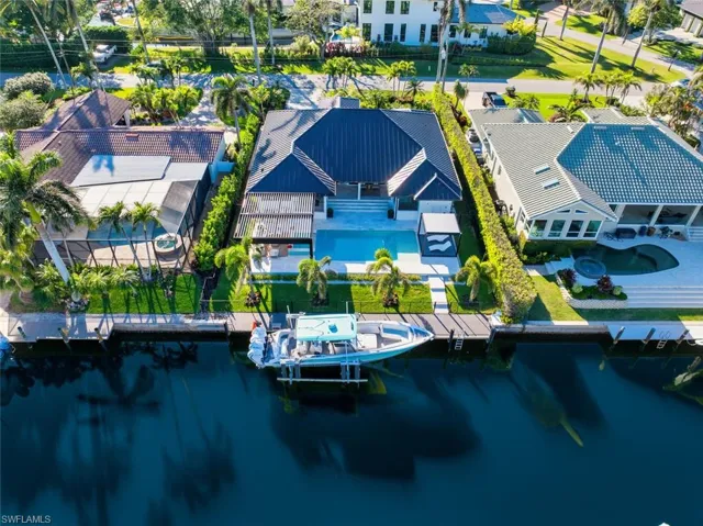 Aerial view with a water view and a residential view