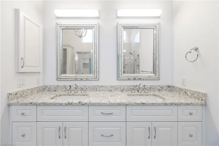 Bathroom featuring vanity and walk in shower