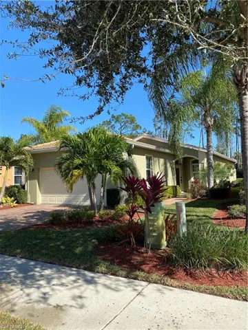 Lovely front entrance including pavered driveway and front walk