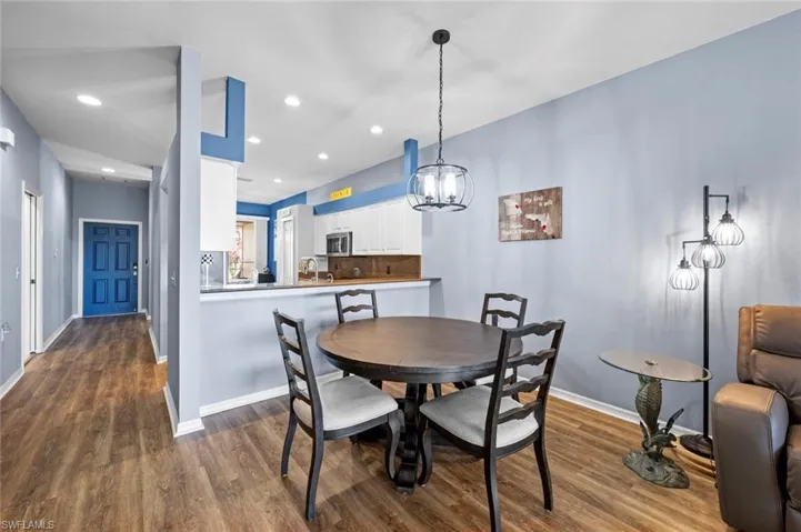 Dining area looking into kitchen