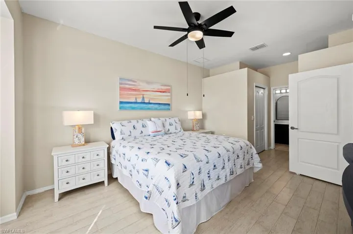 Master bedroom w/walk-in closet and wall closet