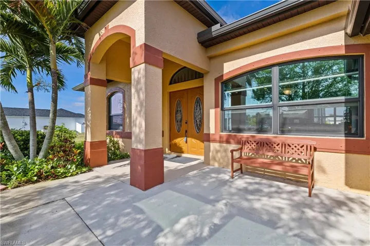 Enjoy the butterfly garden from this wonderful front entry area!