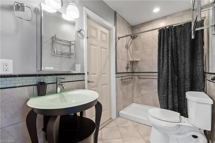 POOL BATH opens to Lanai and also opens to the inside great room.