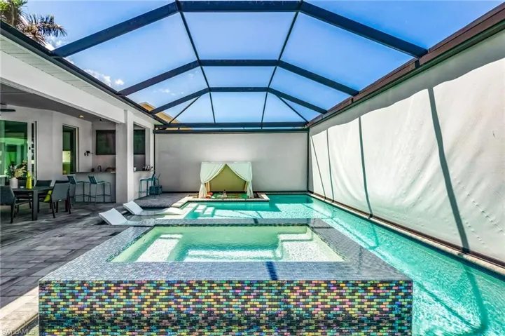 Giant motorized Sun Protection privacy screens, suitable for complete pool privacy, shading, and projector ready quality for evening movies