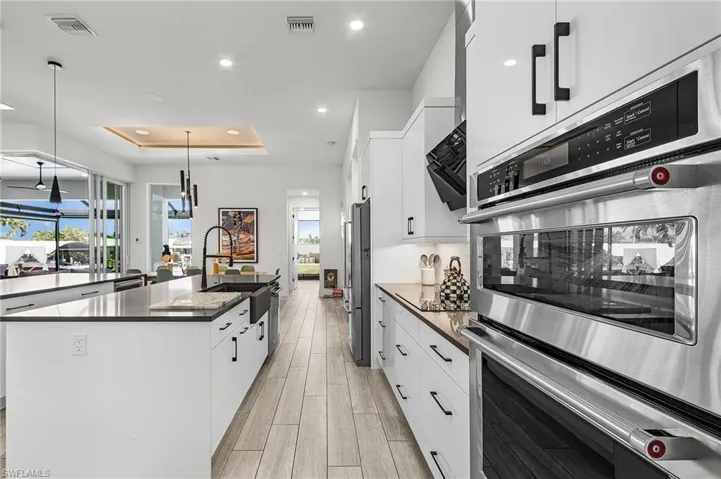 Stainless-Steel Appliances, Quartz Countertops and ample cabinet space make this kitchen a Chef's dream