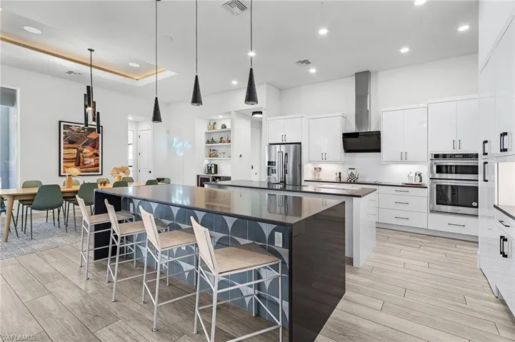 Gourmet Kitchen featuring Dual Kitchen Islands