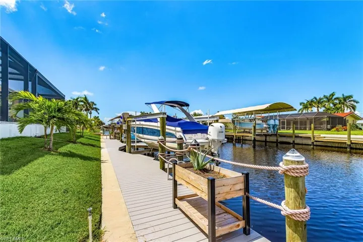 Brand-New Dock with Dual Jet Ski Lift & 13,000 pound boat lift