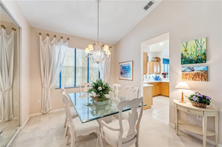 formal dining with mirrored wall