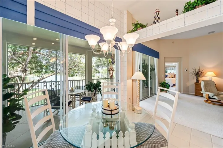 Kitchen dining and lanai screened