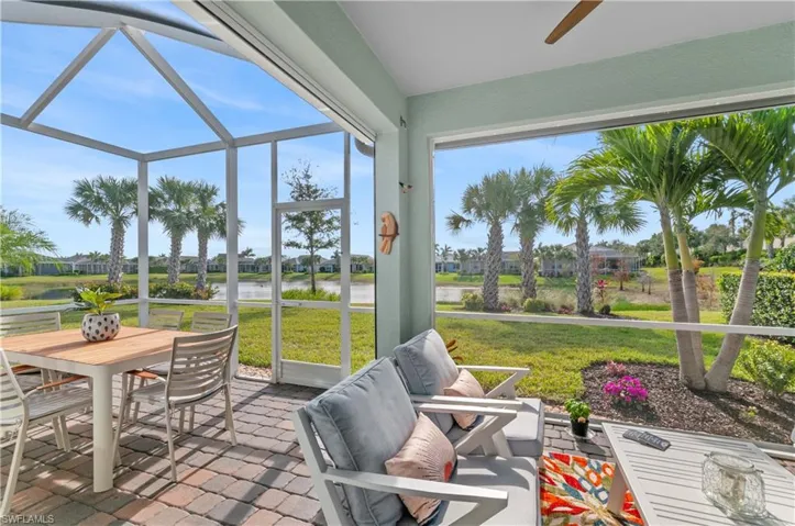 Sunroom featuring ceiling fan