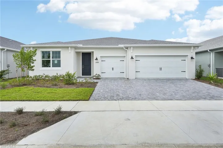 Single story home with a garage