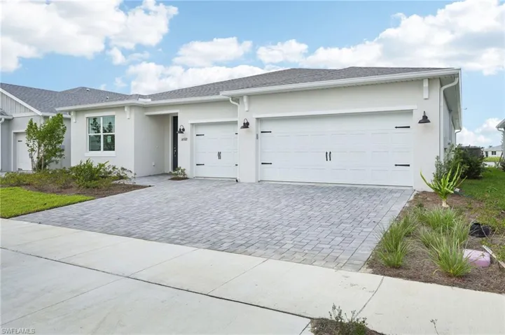 Single story home with a garage