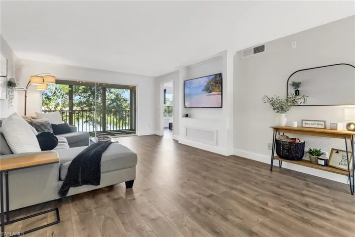 Living room featuring wood-type flooring