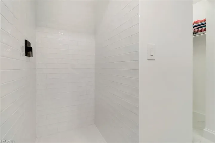 Bathroom with a tile shower