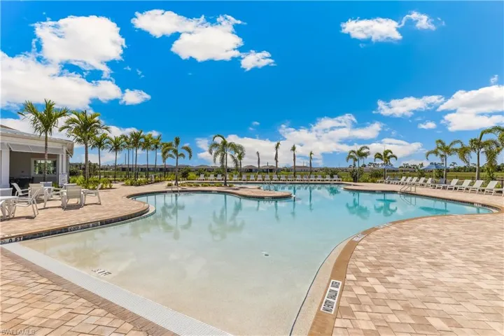 Community pool featuring a patio area