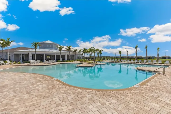 Community pool featuring a patio area