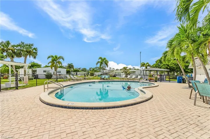 Community pool featuring a patio area