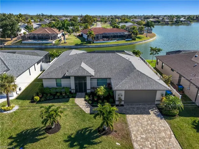 Aerial view of residential area with a nearby body of water