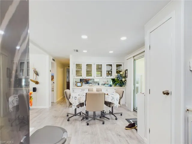 Office space with light wood-type flooring