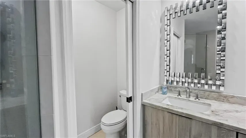 Bathroom with toilet and vanity