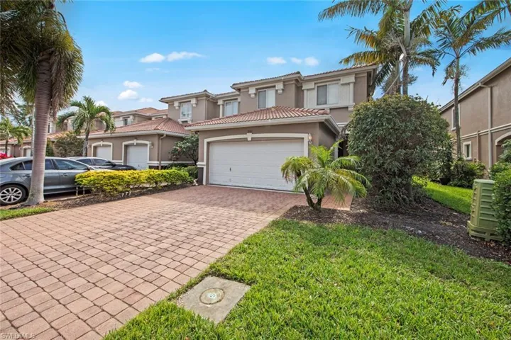 View of front of home featuring a garage