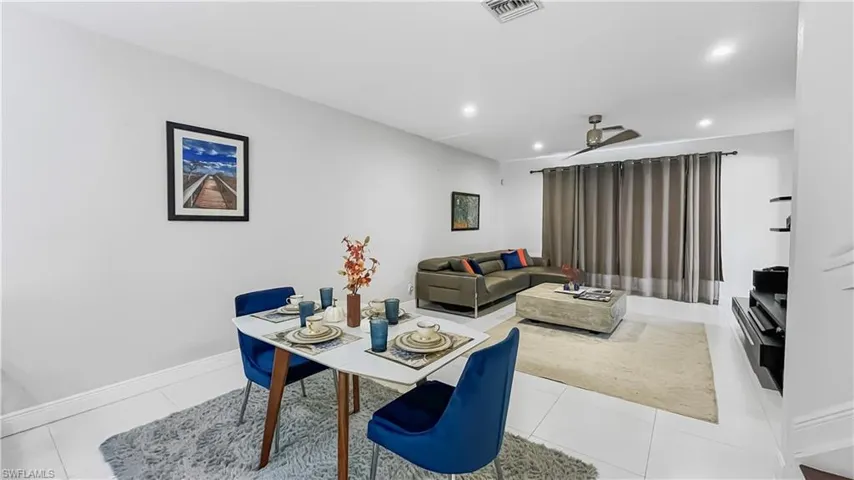 Tiled living room with ceiling fan
