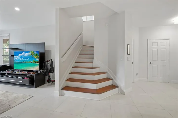 Stairway featuring tile patterned flooring