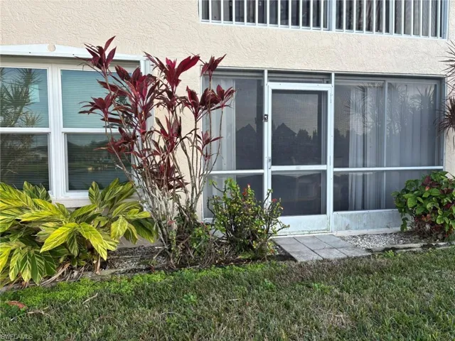End corner unit features screened sunroom