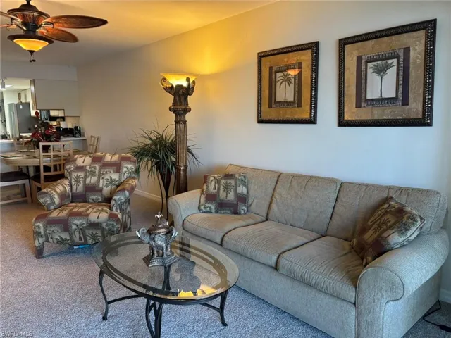 Living room furnishings allow comfortable seating for entertaining or watching television.