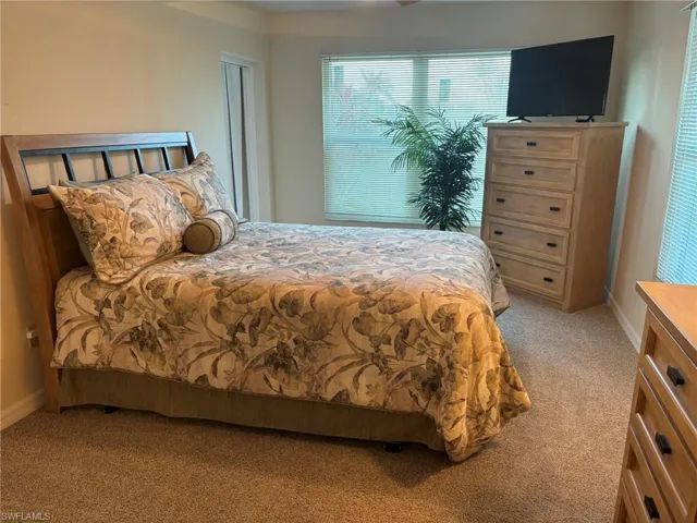 Spacious Master bedroom with queen size bed and water views