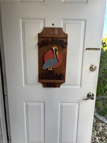 Front door entry also has interior screen door for lovely Florida breezes
