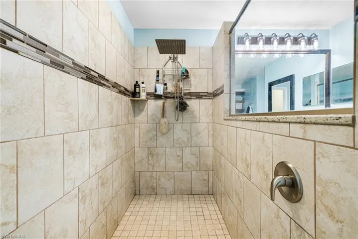 Bathroom with a tile shower