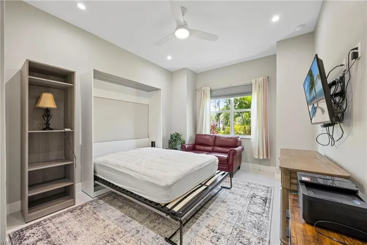 Bedroom featuring a ceiling fan and recessed lighting