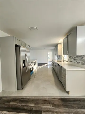 Access to large Kitchen from Living Room